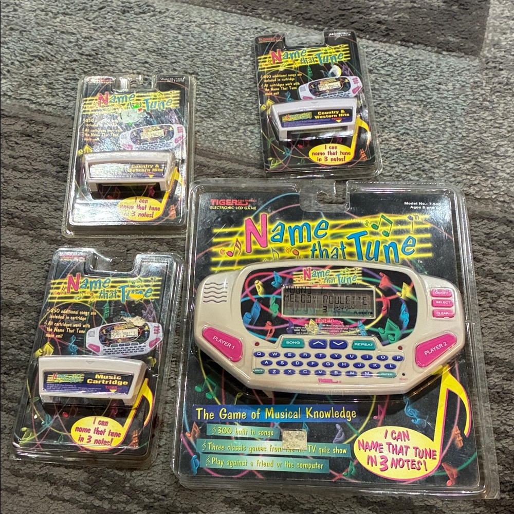 Name That Tune Handheld Game - White/Pink 1997